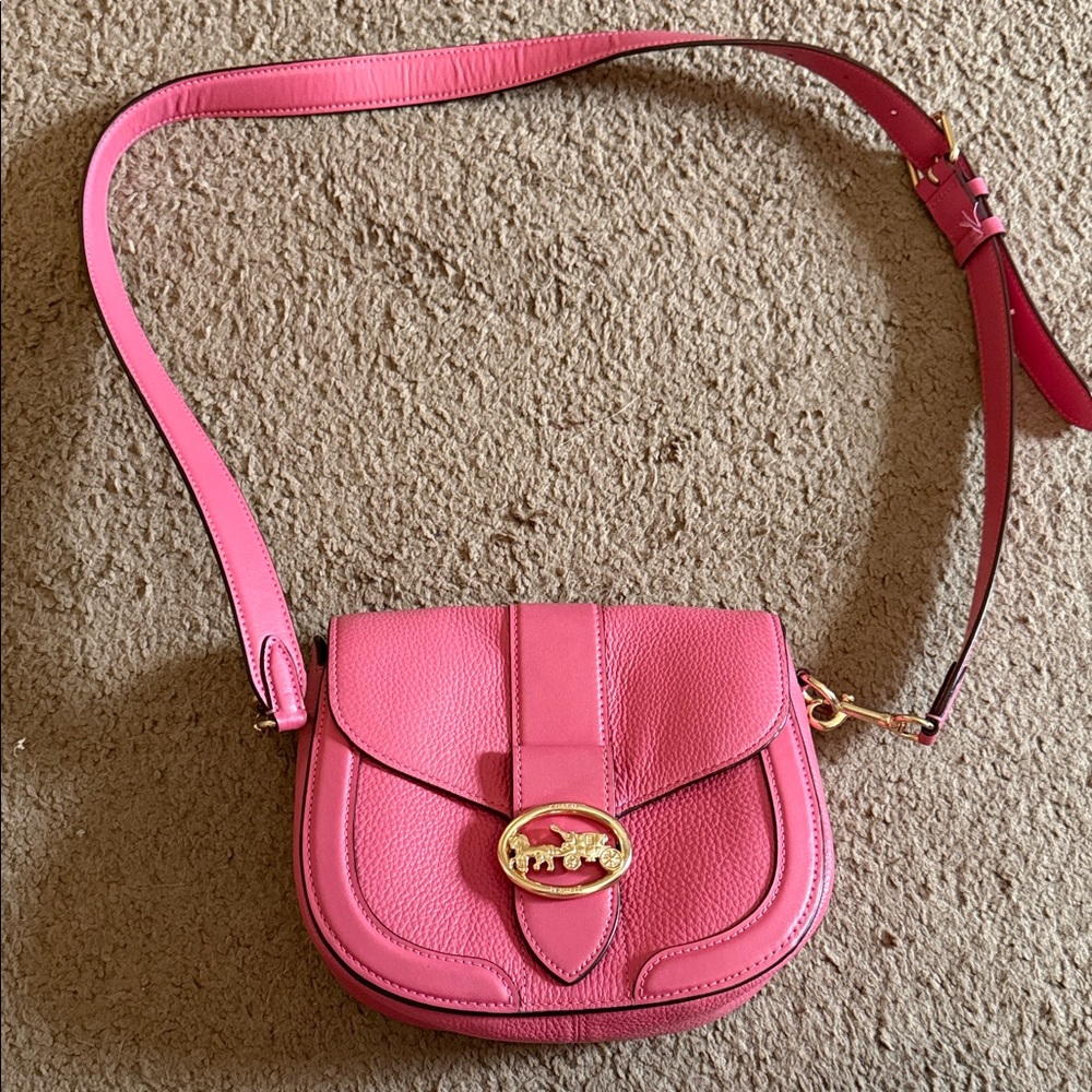 Coach Georgie Saddle Bag in a pink. Barely used.